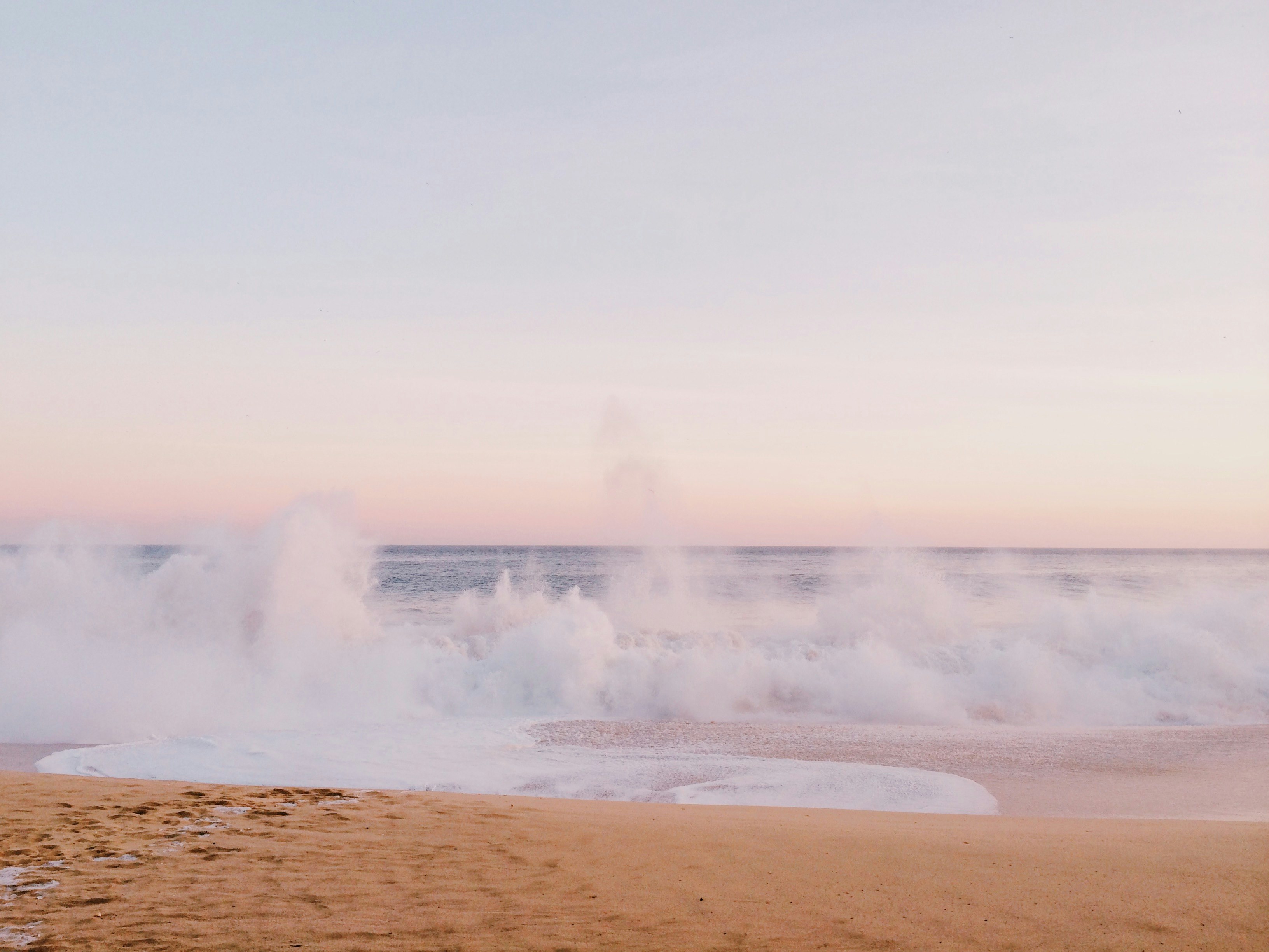 sea waves during golden hour